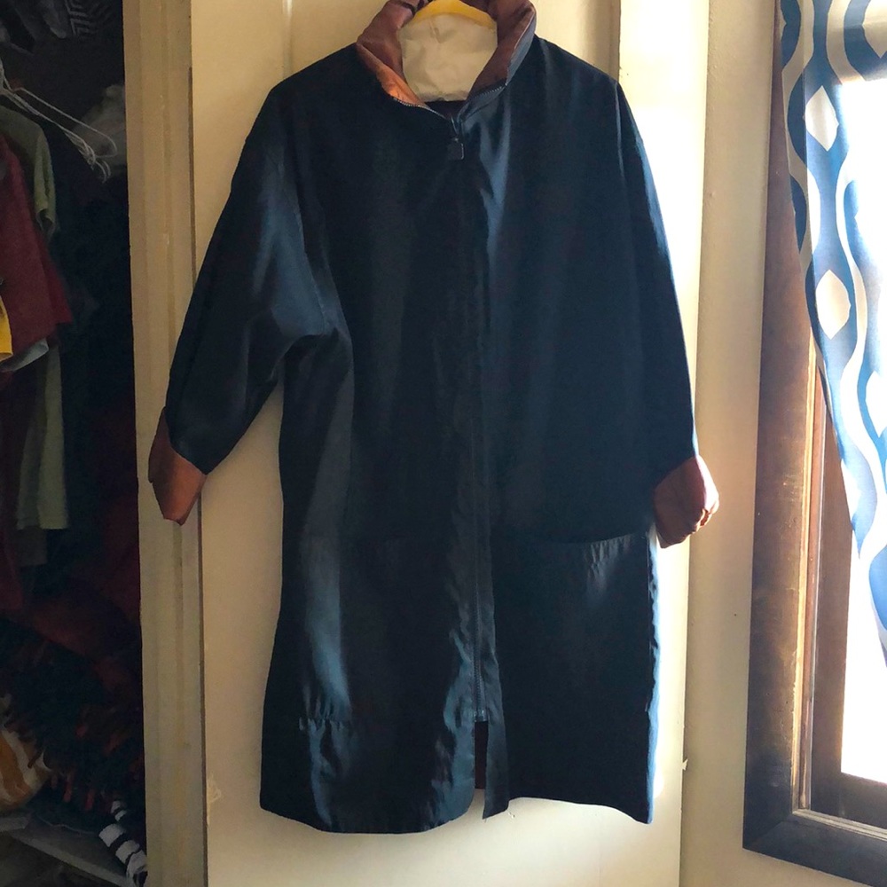 MPDW reversible rain coat. No size listed. Fits size sm.